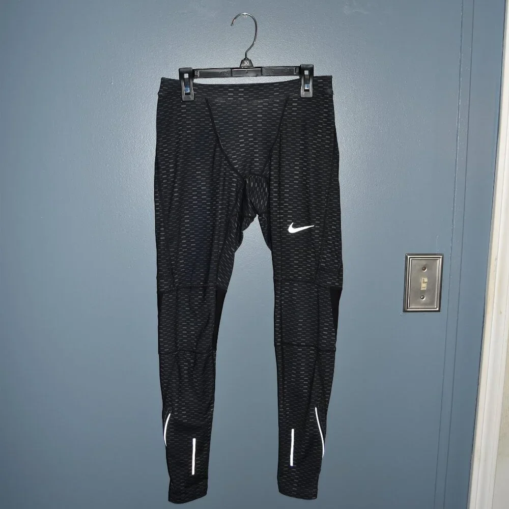 Nike Dri-Fit running tights size Small‎